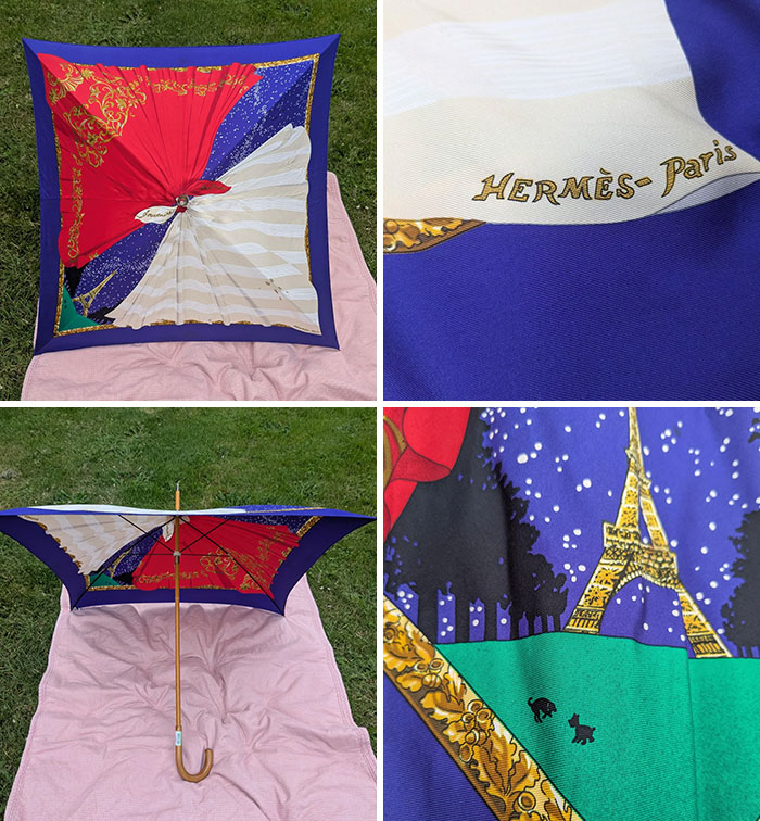 Colorful Hermes Paris umbrella thrift store find with detailed Paris-themed design displayed on grass and cloth.