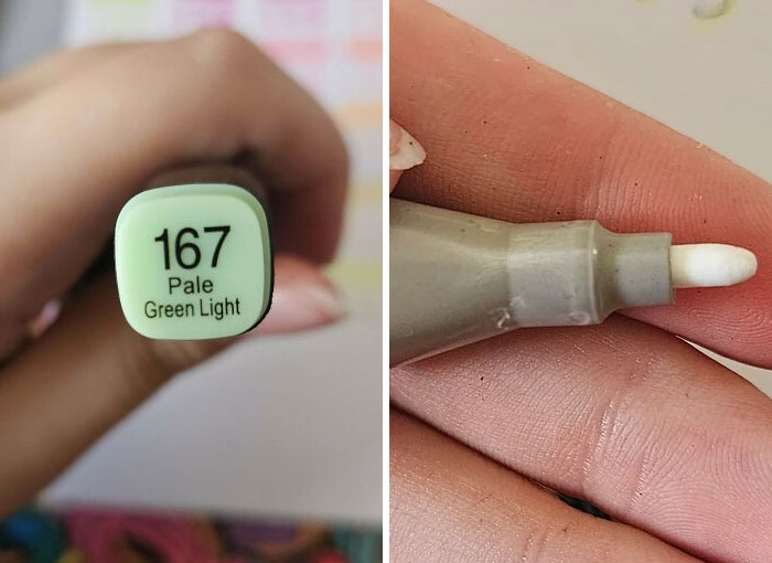 Close-up of a hand holding a pale green marker labeled 167 and a cap missing its green light tip in a preventable fail.