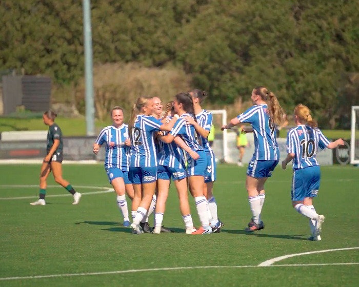 16YO footballer celebrating on the field with teammates, confidently responding to online trolls and criticism. 16YO footballer celebrating on the field with teammates, confidently responding to online trolls and criticism.