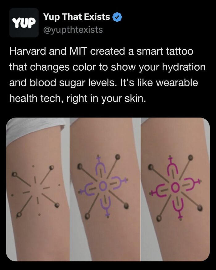 Smart tattoo changes color on arm showing hydration and blood sugar levels as wearable health tech on skin.