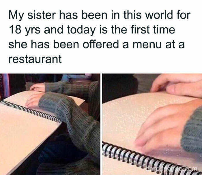 Student touching the Braille menu in a restaurant for the first time, highlighting experiences of students and young adults.