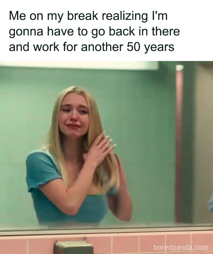 Woman looking stressed and crying at work, satirizing the millennial corporate life during a break.