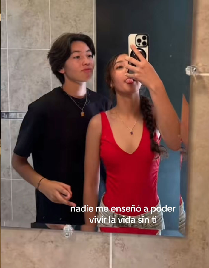 Teen girl and young man taking a mirror selfie, linked to doctor suspended after fatal breast surgery SEO keywords. Teen girl and young man taking a mirror selfie, linked to doctor suspended after fatal breast surgery SEO keywords.