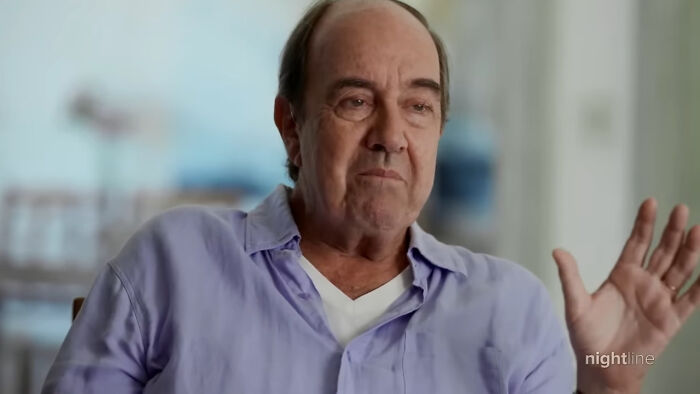 Man in a purple shirt discussing bold decisions that made a massive impact on almost the whole world.