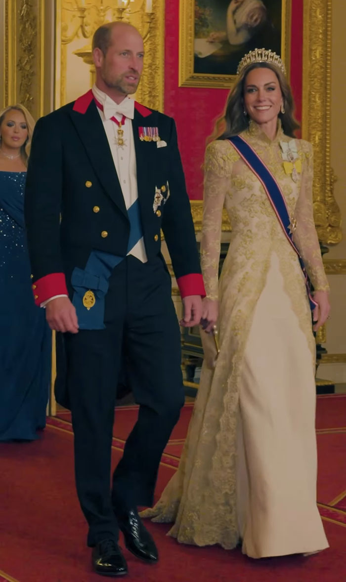 Prince William and Kate Middleton in formal attire at an event, highlighting Queen Camilla&rsquo;s embarrassing gesture controversy.