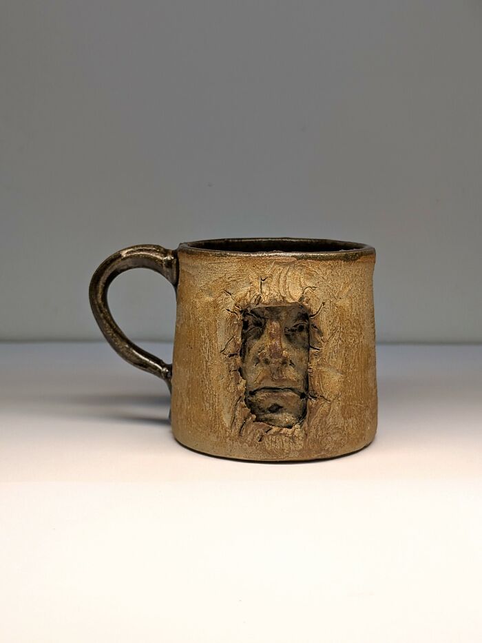 In The Wall Mug By Adam Rush