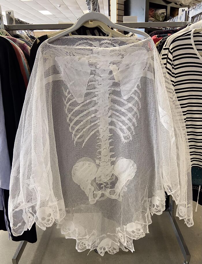 White mesh skeleton garment hanging on a rack, one of the weirdest purchases people would make in a heartbeat.