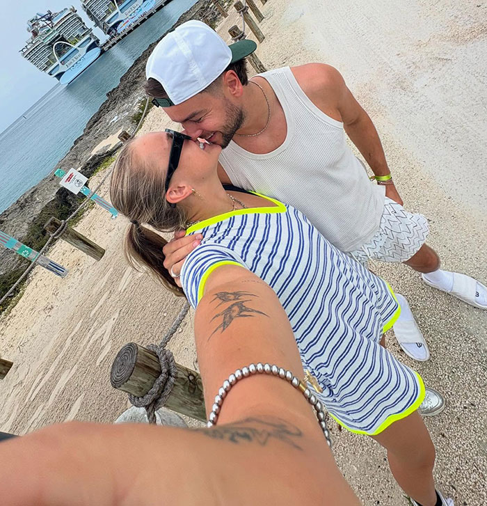 Couple sharing a close moment outdoors, highlighting JoJo Siwa&rsquo;s style and marriage plans with fans intrigued.