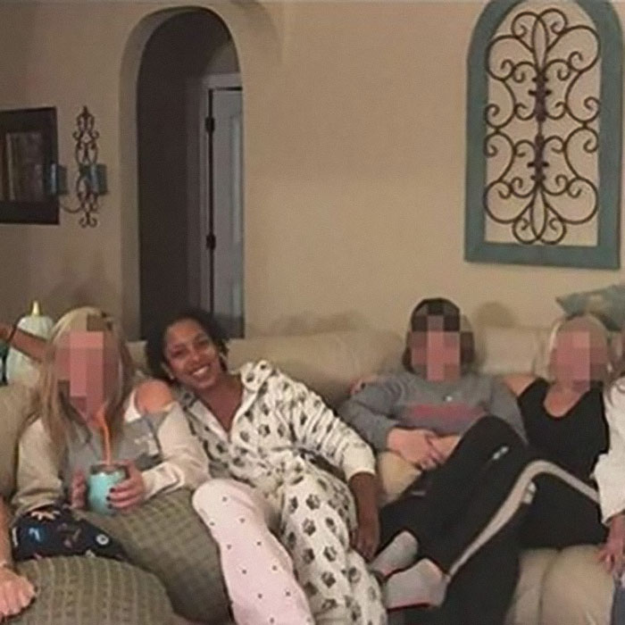 Group of people on a couch in a home, related to Brooklyn midwife&rsquo;s dice game club safety concerns for non-white women.