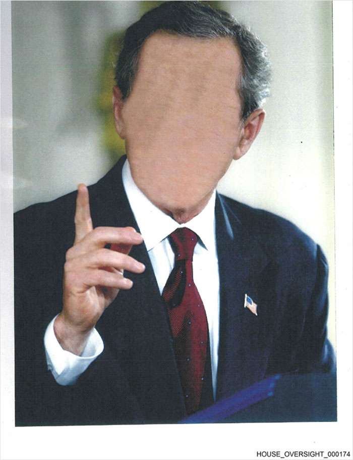 Man in suit with American flag pin and red tie, gesturing with finger, representing Jeffrey Epstein 50th birthday book content.