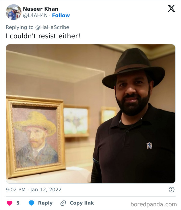 Man wearing a hat posing next to a framed painting in a museum showcasing life imitating art moments.