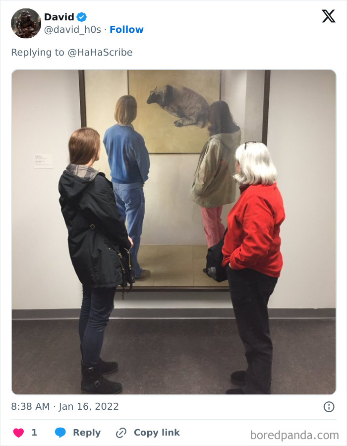 Four people standing in front of a painting resembling their poses, showcasing life imitating art perfectly.