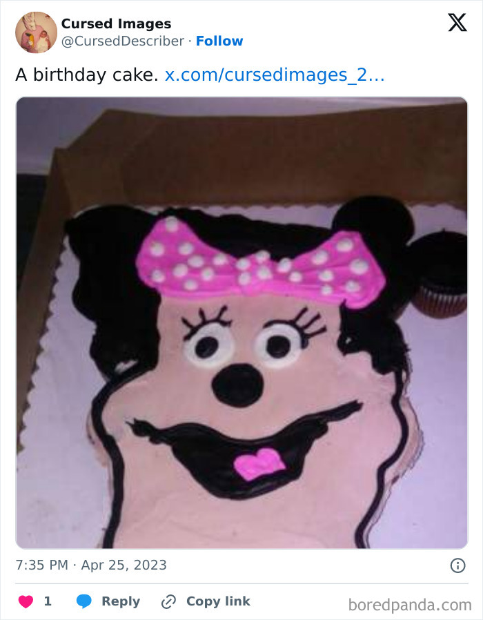 Disturbing picture of a birthday cake with a misshapen cartoon character face and a pink bow, looking wrong and cursed.