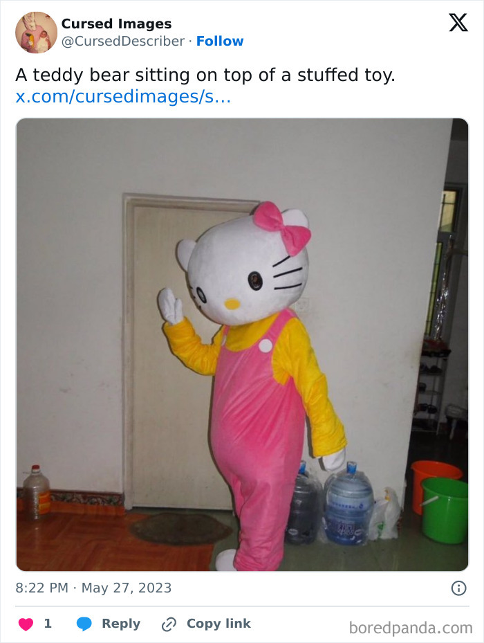 Disturbing picture of a creepy Hello Kitty costume character standing indoors with water jugs and cleaning supplies nearby.
