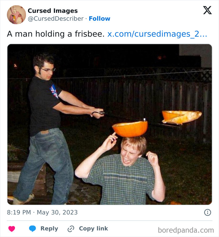 Two men in a yard with one swinging a pumpkin piece toward the other in a disturbing cursed images photo.