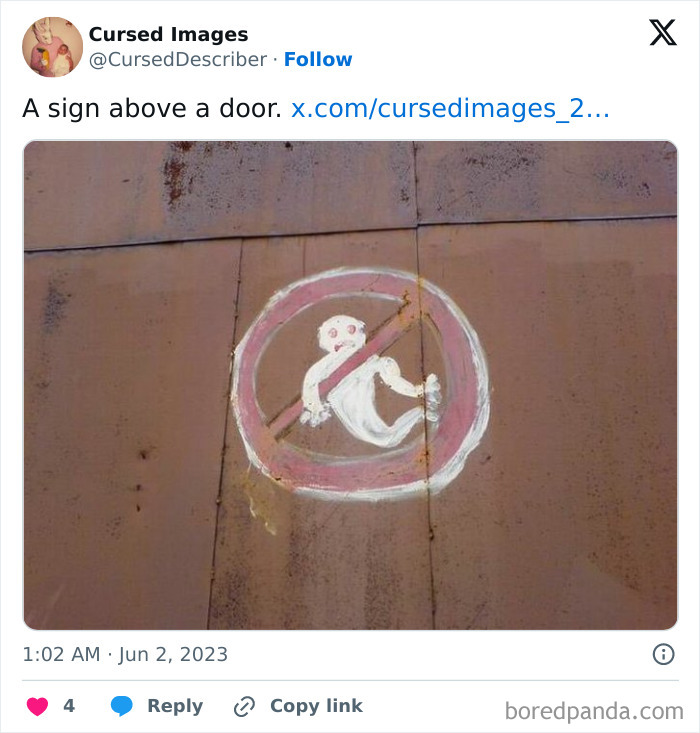 A disturbing painted sign above a door features a ghostly figure inside a red prohibition circle.