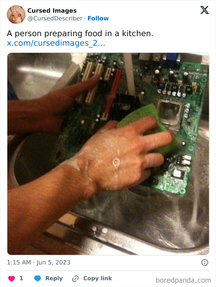 Washing a computer motherboard in a kitchen sink, an unusual disturbing picture that seems cursed and wrong.