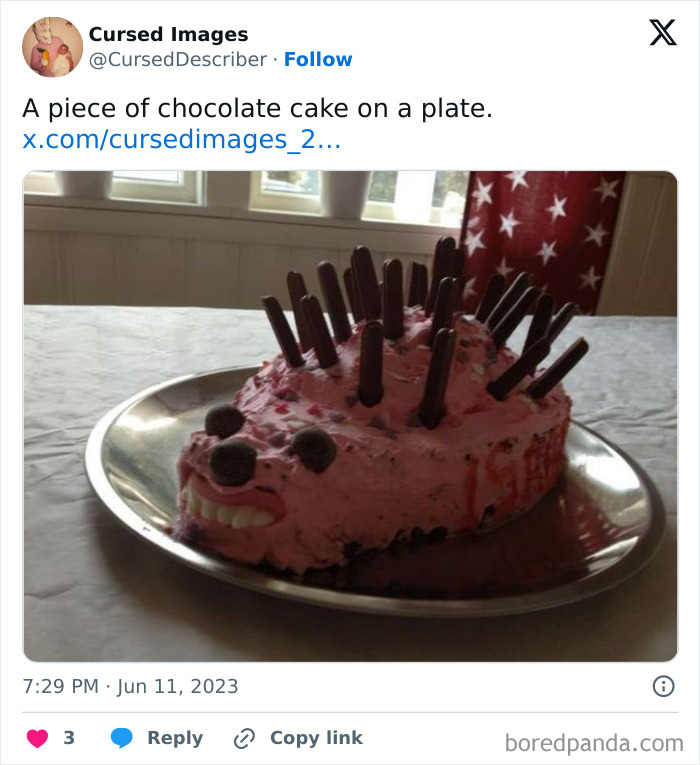 Disturbing picture of a pink cake with fake teeth and chocolate sticks on a metal plate, looking cursed and unsettling.