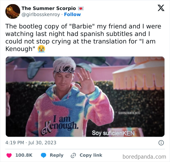 Man in colorful hoodie with text I am Kenough, raising hand, showcasing relatable humor to laugh away fatigue of being human.