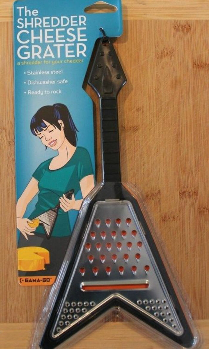 Rock-style cheese grater shaped like an electric guitar, a quirky and weird purchase people would make in a heartbeat