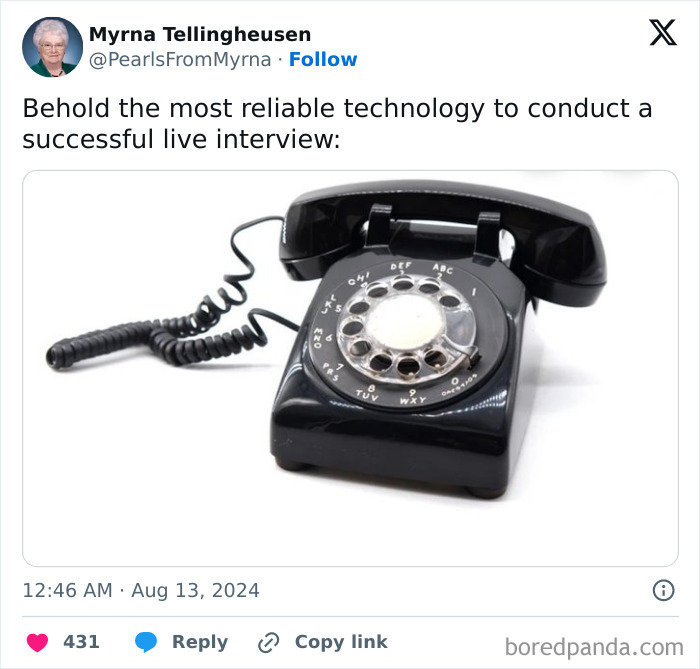 Vintage black rotary telephone with coiled cord on white background, illustrating internet’s funniest grandma humor.