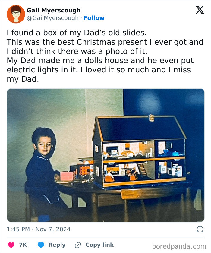 Child sitting beside a detailed dollhouse with electric lights, showcasing a funny and wholesome parent moment shared by kids.