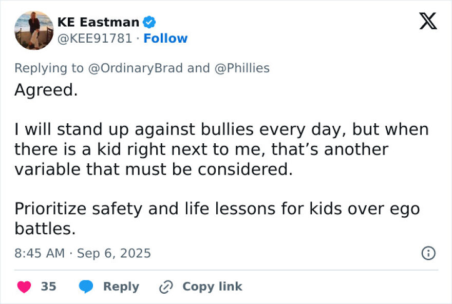 Tweet from KE Eastman discussing standing up against bullies while prioritizing safety and life lessons for kids during Phillies Karen incident.