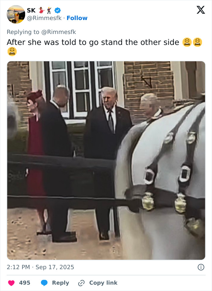 Queen Camilla&rsquo;s embarrassing gesture to Kate Middleton during Trump visit with men standing outside a building near a horse.