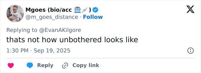 Screenshot of a tweet reply by Mgoes discussing Tyler Robinson hours after Kirk crime in an online conversation.