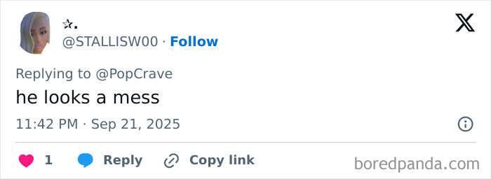 Tweet screenshot showing a user replying to PopCrave with the comment he looks a mess at night.