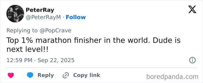 Tweet from user PeterRay praising a top 1 percent marathon finisher showing impressive speed at a Berlin marathon event.