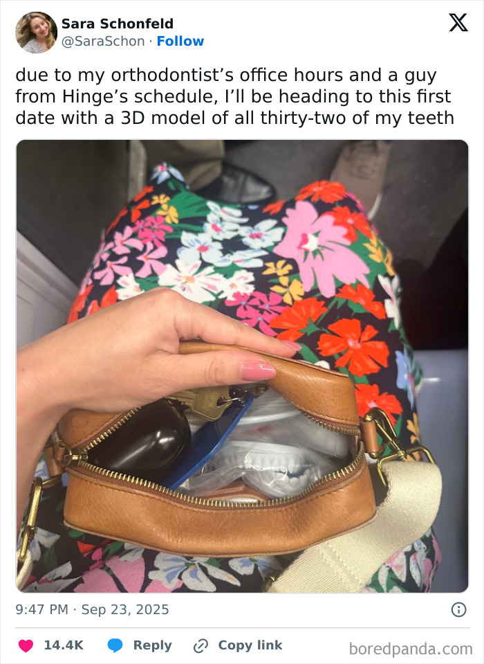 Woman holding a bag with 3D teeth model inside, part of funniest tweets from September that made people laugh most.