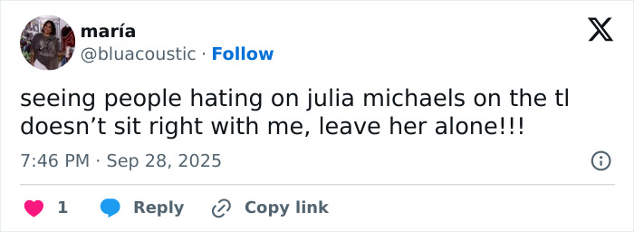 Twitter user expressing support for Julia Michaels, reacting to negative comments on her timeline.