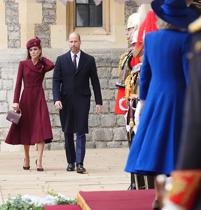 Kate Middleton and Prince William walking past ceremonial guards during Queen Camilla&rsquo;s controversial gesture at Trump visit.