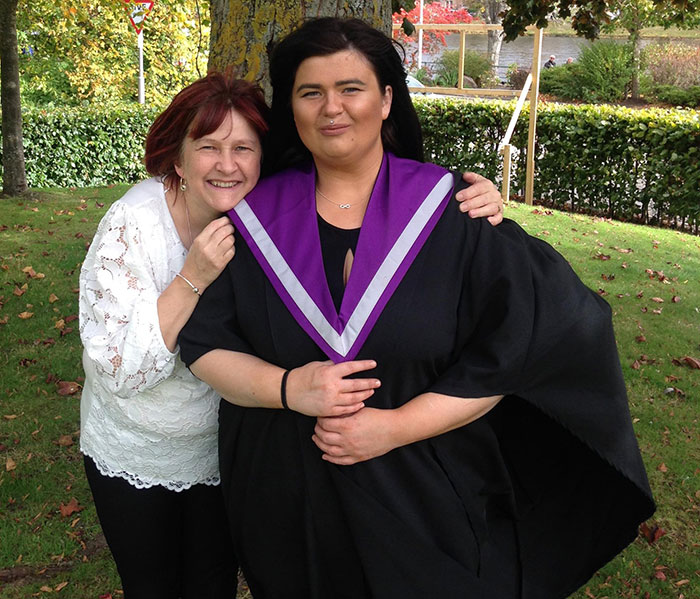 Mother and daughter posing outdoors, highlighting the story of a mom who married man she met online found lifeless.