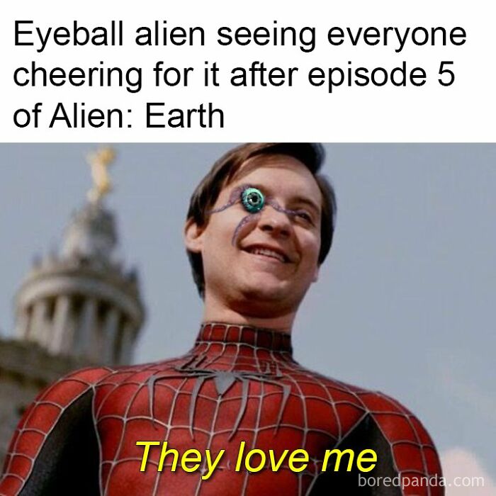 Spider-Man with an alien eye edited on his face smiling, Marvel memes humor showing "They love me" caption.