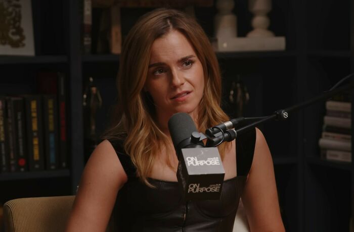 Emma Watson speaking into microphone during a podcast episode discussing J.K. Rowling brutal response and controversies. Emma Watson speaking into microphone during a podcast episode discussing J.K. Rowling brutal response and controversies.