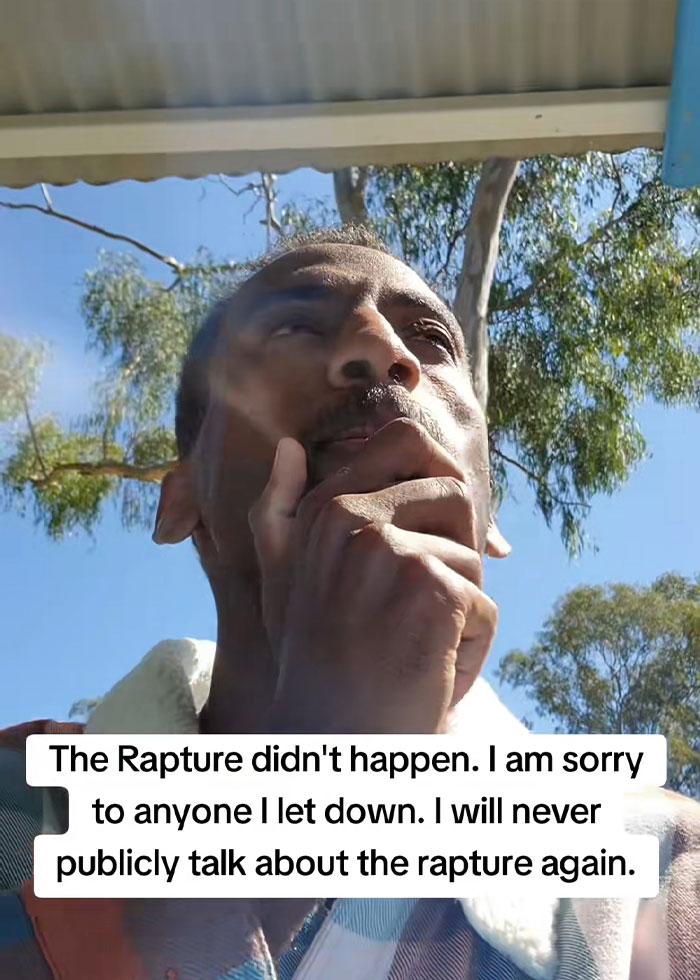 Man outdoors looking regretful with text about rapture prediction apology, reflecting RaptureTok viral prediction emotions.