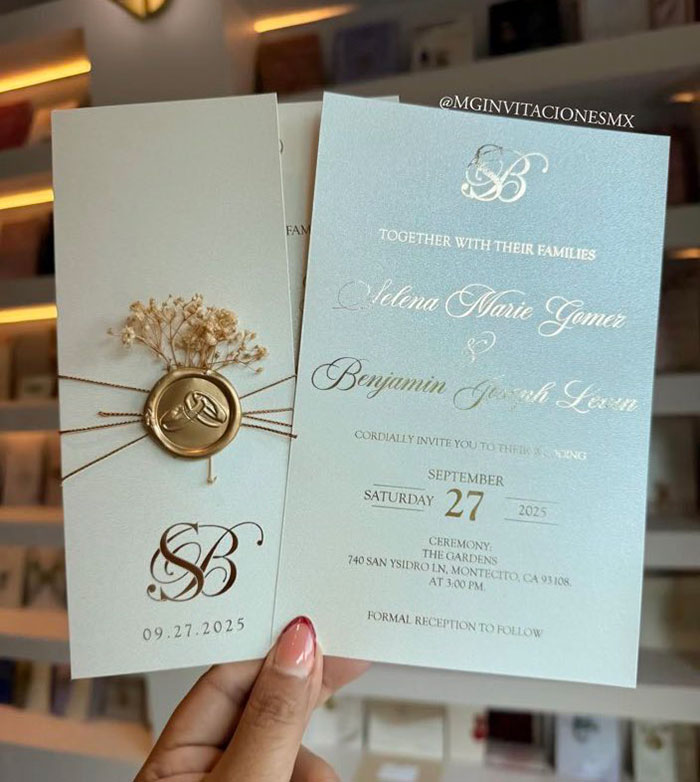Wedding invitation for Selena Gomez and Billy Blanco featuring elegant design and date, linked to star-studded wedding outfits coverage.