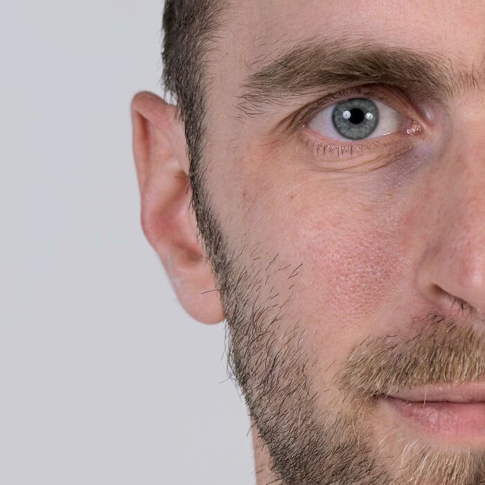 Close-up portrait of a man showcasing genetic features highlighting the strong family DNA connection in side-by-side portraits.