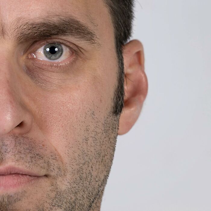 Close-up portrait of a man showcasing genetic features highlighting the strong family DNA connection in side-by-side portraits.