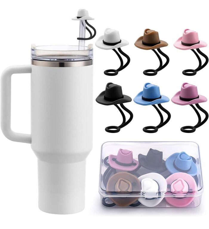 Colorful miniature cowboy hat straw toppers displayed with white travel mug, showcasing weird purchases people would make instantly.