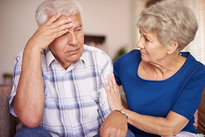 Elderly woman comforting distressed man at home, reflecting on woman’s life turned upside down and sister’s dying wish. Elderly woman comforting distressed man at home, reflecting on woman’s life turned upside down and sister’s dying wish.