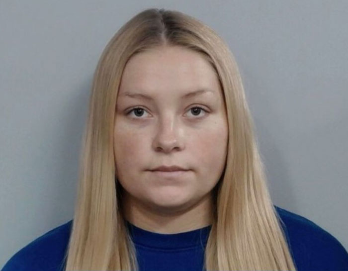 Young cheerleader facing court, appearing glammed up while pleading not guilty after newborn found in closet case