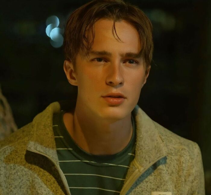 Young man with a thoughtful expression reflecting on the moment he realized he had fallen out of love at night.