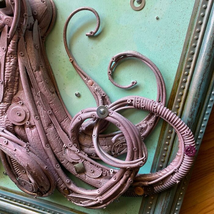 Octopus sculpture made from recycled trash and scrap materials, showcasing stunning animal sculptures created by an innovative artist.