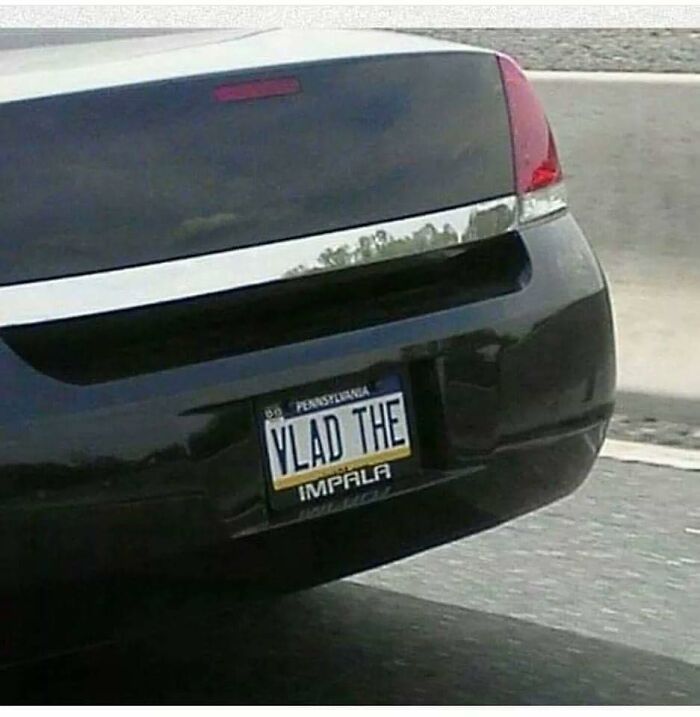Black car with Pennsylvania license plate reading Vlad The Impala, a humorous meme related to Eastern Europe culture.