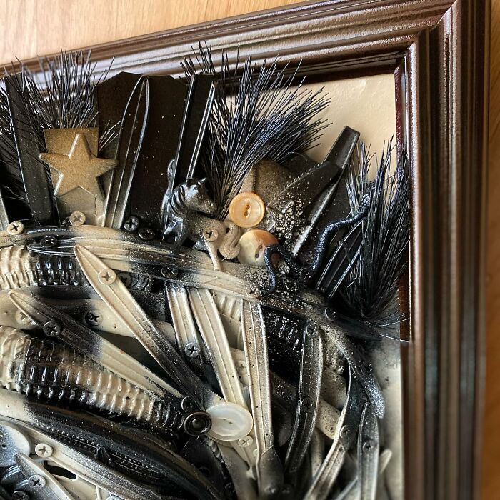 Horse sculpture made from recycled trash and metal parts, showcasing stunning animal sculptures in a framed wall art piece.