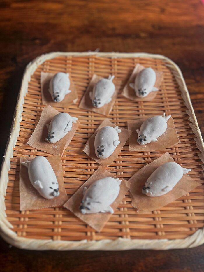 Creative meals for kids featuring adorable seal-shaped desserts on ice in a wooden bowl, showcasing inventive food art from Japan.