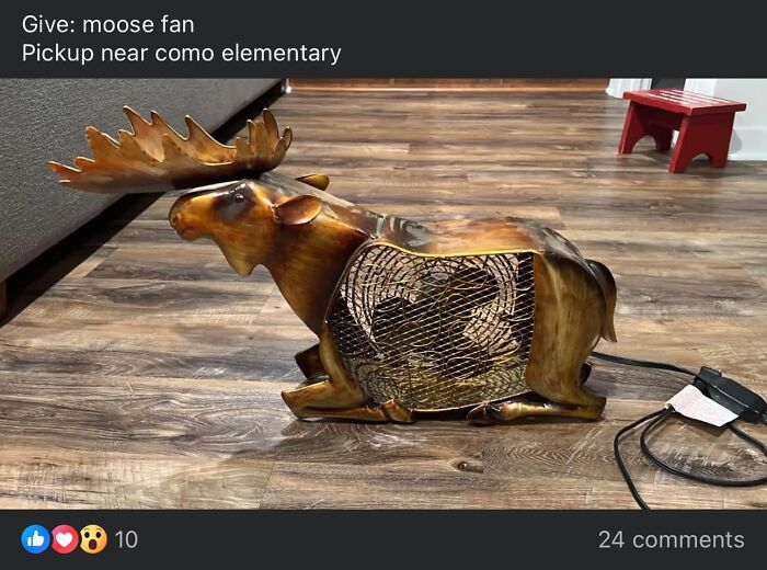 Metal moose-shaped fan sitting on wood floor, showcasing one of the weirdest purchases people would make quickly.